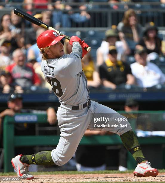 Harrison Bader of the St. Louis Cardinals hits an RBI single to right field in the eighth inning during the game against the Pittsburgh Pirates at...