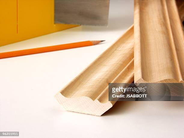 crown moulding - moulding a shape stock pictures, royalty-free photos & images