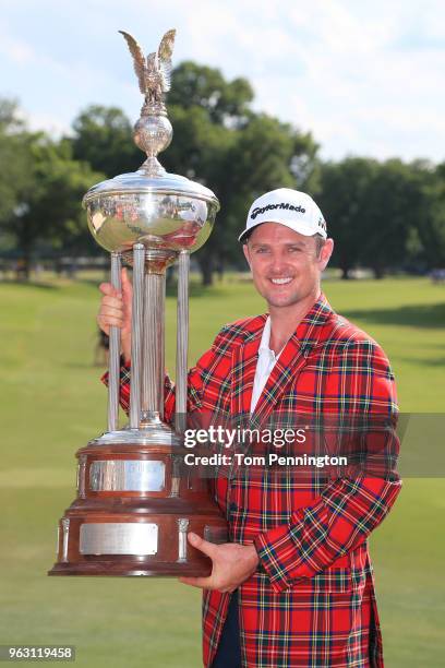 Justin Rose of England poses with the trophy after winning the Fort Worth Invitational at Colonial Country Club on May 27, 2018 in Fort Worth, Texas.