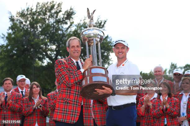 Colonial Country Club President Rob Doby presents the trophy to Justin Rose of England after he won the Fort Worth Invitational at Colonial Country...