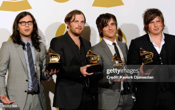 Musicians Nathan Followill, Caleb Followill, Jared Followill and Matthew Followill of Kings Of Leon pose with Best Rock Performance By A Duo Or Group...