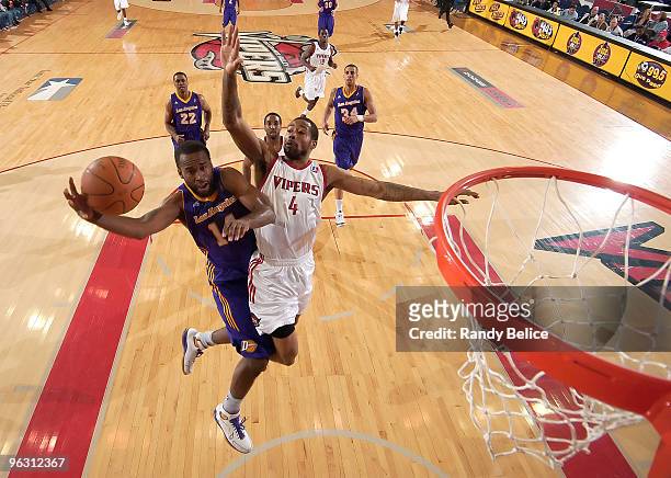 Joe Crawford of the Los Angeles D-Fenders goes to the basket past Antonio Anderson of the Rio Grande Valley Vipers during the NBA D-League game on...
