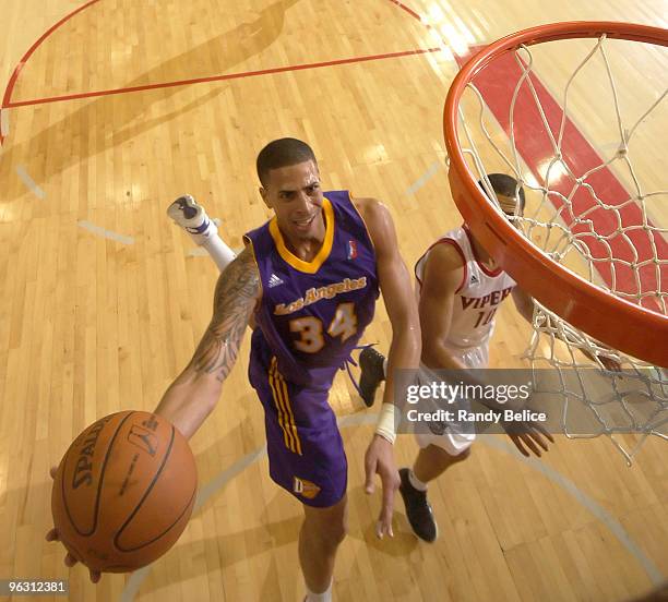 Diamon Simpson of the Los Angeles D-Fenders drives to the basket past Jonathan Wallace of the Rio Grande Valley Vipers during the NBA D-League game...