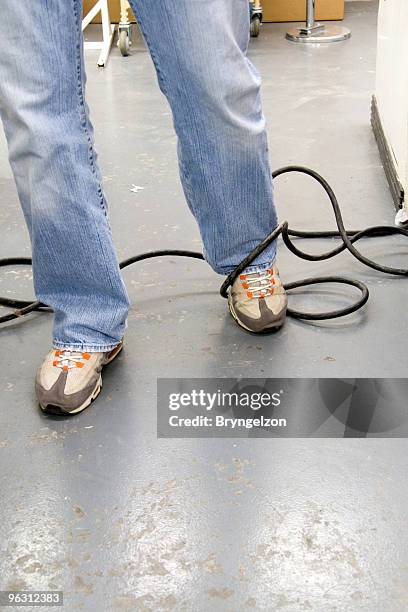 tripping on an electrical cord - stumble stock pictures, royalty-free photos & images