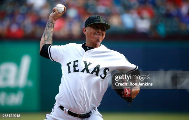 Jesse Chavez of the Texas Rangers throws against the Kansas City Royals during the ninth inning at Globe Life Park in Arlington on May 27, 2018 in...