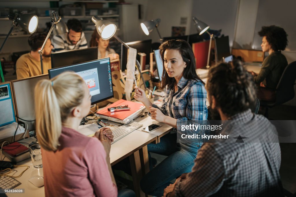 Young Programmers Team Of Young Computer Programmers Talking In The Office High-Res Stock ...