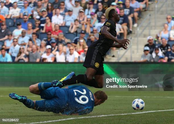 Sporting Kansas City goalkeeper Tim Melia is called for a foul in the box against Columbus Crew forward Gyasi Zerdes in the first half of an MLS...