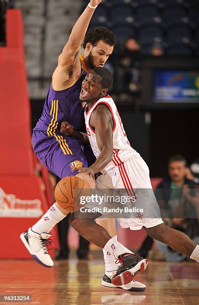 Craig Winder of the Rio Grande Valley Vipers draws a foul from Keith Clark of the Los Angeles D-Fenders during the NBA D-League game on January 31,...