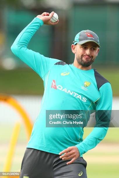 Nathan Lyon throws during an Australian ODI training session at Allan Border Field on May 28, 2018 in Brisbane, Australia.