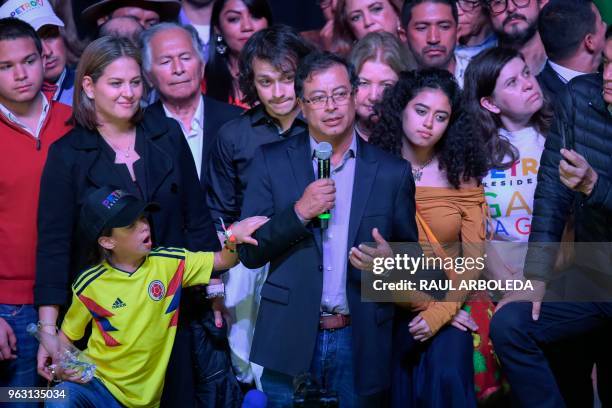 Colombian presidential candidate Gustavo Petro for the Colombia Humana Party addresses supporters in Bogota, next to his wife Veronica Alcocer , and...