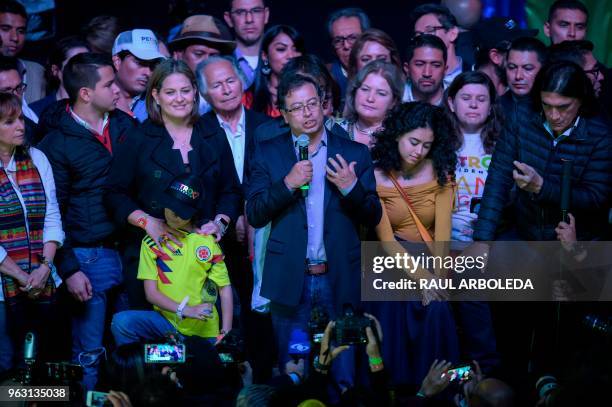 Colombian presidential candidate Gustavo Petro for the Colombia Humana Party addresses supporters in Bogota, next to his wife Veronica Alcocer ,...
