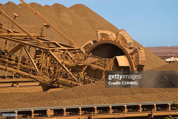 reclaimer stockpile on iron ore mine site - iron ore stock pictures, royalty-free photos & images