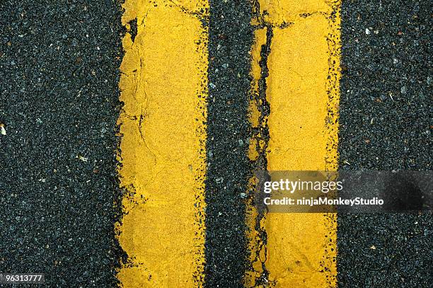 yellow lane divider - road marking stock pictures, royalty-free photos & images