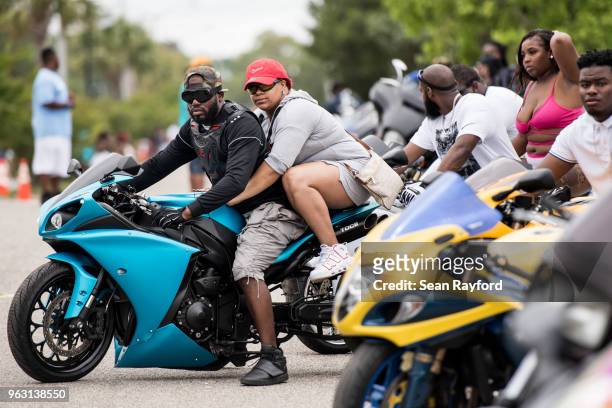 Motorcyclist pulls out onto Atlantic Street during Black Bike Week on May 27, 2018 in Atlantic Beach, South Carolina. Also known as Atlantic Beach...