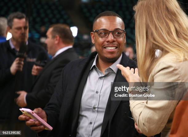 Paul Pierce getting pre-broadcast advice from Heather Walker, Celtics senior director of public relations, before the game. The Boston Celtics hosted...
