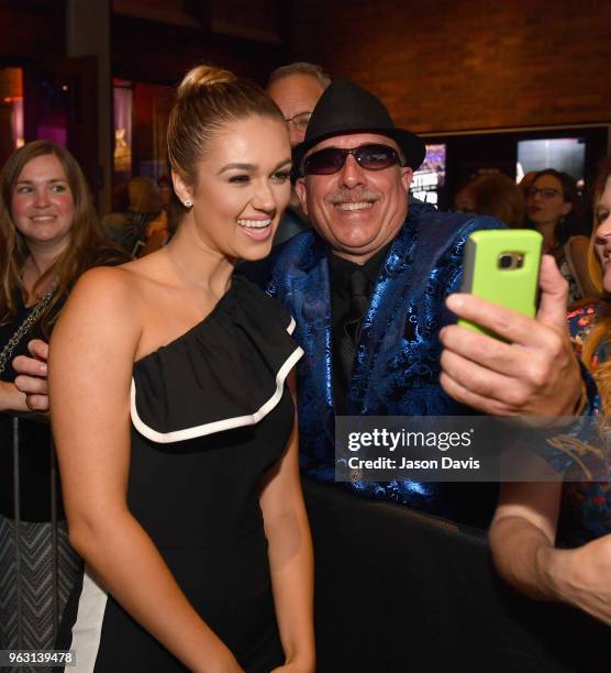 Actress Sadie Robertson takes photos with fans before the 6th Annual KLOVE Fan Awards at The Grand Ole Opry on May 27, 2018 in Nashville, Tennessee.