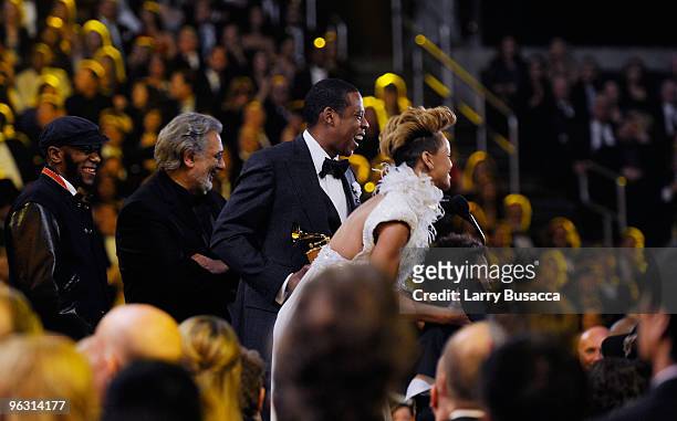 Singer Rihanna and rapper Jay-Z accept the Best Rap/Sung Collaboration from Mos Def and Placido Domingo onstage onstage during the 52nd Annual GRAMMY...