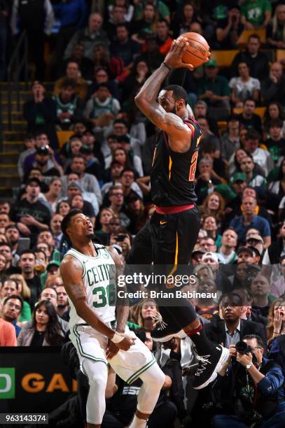 LeBron James of the Cleveland Cavaliers handles the ball against Marcus Smart of the Boston Celtics during Game Seven of the Eastern Conference...