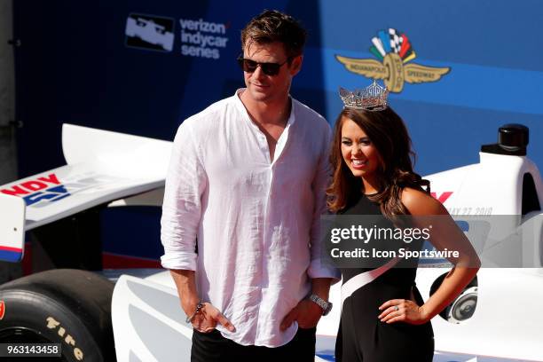 Actor Chris Hemsworth poses for a picture with Miss America Cara Mund on the red carpet during the Indianapolis 500 on May 27 at the Indianapolis...