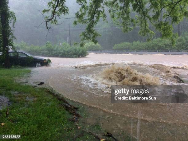 Rogers and Main Street flood on Sunday, May 27, 2018 in Ellicott City in Maryland.