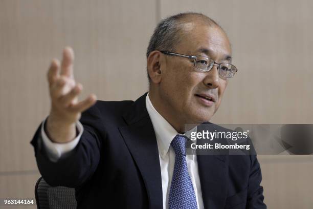 Akira Sugano, president and chief executive officer of Asset Management One Co., a unit of Mizuho Financial Group Inc., speaks during an interview in...