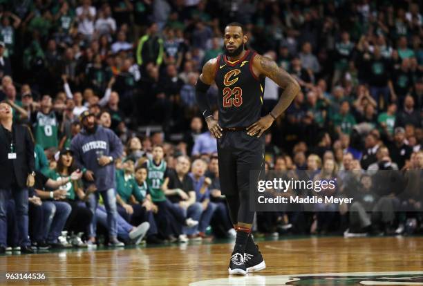 LeBron James of the Cleveland Cavaliers reacts in the first half against the Boston Celtics during Game Seven of the 2018 NBA Eastern Conference...