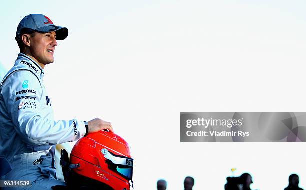 Michael Schumacher of Germany and Mercedes poses for a photo during new car presentation at the Ricardo Tormo Circuit on February 1, 2010 in...