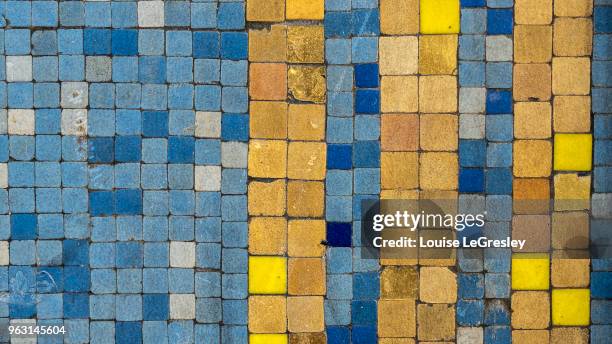 ancient blue and yellow mosaic tiles - blue mosaic stock pictures, royalty-free photos & images