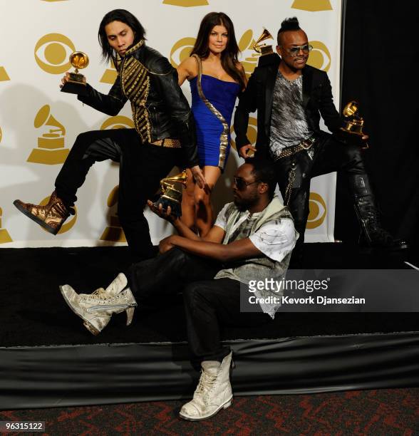 Musicians Will.i.am ,Taboo, Fergie and apl.de.ap of Black Eyed Peas poses with Best Pop Performace award for 'I Got A Feeling', Best Pop Vocal Album...