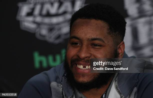 Devante Smith-Pelly of the Washington Capitals speaks to the media during Media Day for the 2018 NHL Stanley Cup Final at T-Mobile Arena on May 27,...