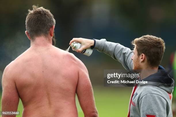 International recruit Geoff Parling of the Rebels gets his troublesome shoulder attended to with cold spray during a Melbourne Rebels Super Rugby...