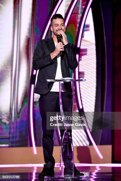 Comedian John Crist speaks onstage during the 6th Annual KLOVE Fan Awards at The Grand Ole Opry on May 27, 2018 in Nashville, Tennessee.