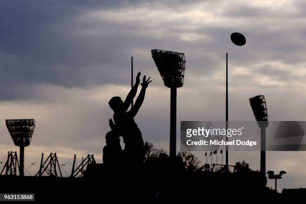 Matthew Philip of the Rebels receives the ball in front of the Melbourne Cricket Ground light towers during a Melbourne Rebels Super Rugby training...