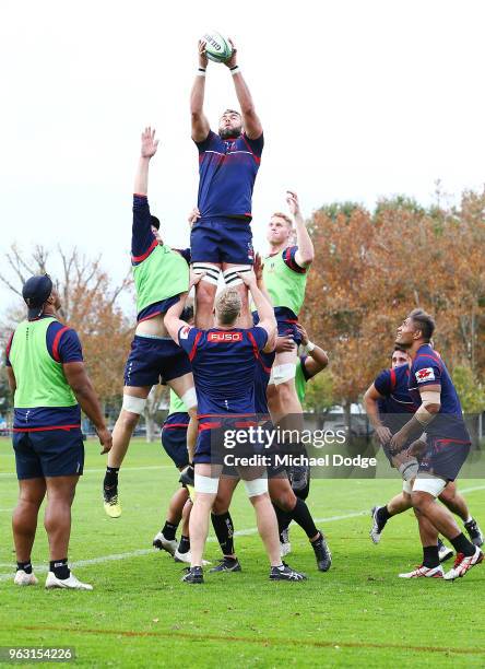 International recruit Geoff Parling receives the ball during a Melbourne Rebels Super Rugby training session at Gosch's Paddock on May 28, 2018 in...
