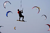 kiteboarder and kites
