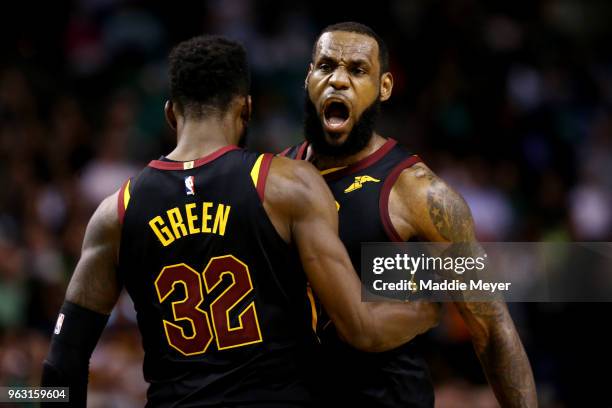 LeBron James of the Cleveland Cavaliers celebrates with Jeff Green during Game Seven of the 2018 NBA Eastern Conference Finals against the Boston...