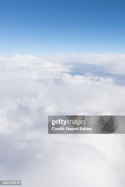 fluffy white cumulus clouds - naomi rahim stock pictures, royalty-free photos & images