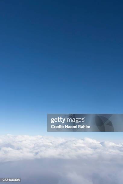 fluffy white clouds - naomi rahim stock pictures, royalty-free photos & images