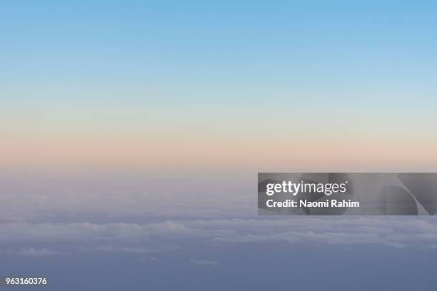 aerial view of a hazy sunset - naomi rahim stock pictures, royalty-free photos & images