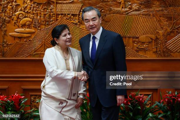 China's Foreign Minister Wang Yi meets Shamshad Akhtar, Executive Secretary of the United Nations Economic and Social Commission for Asia and the...