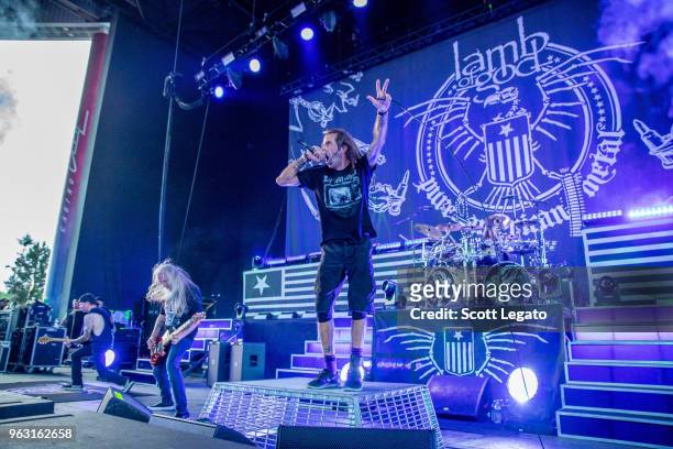 Willie Adler, John Campbell, Randy Blythe and Chris Adler of Lamb of God perform at Michigan Lottery Amphitheatre on May 27, 2018 in Sterling...