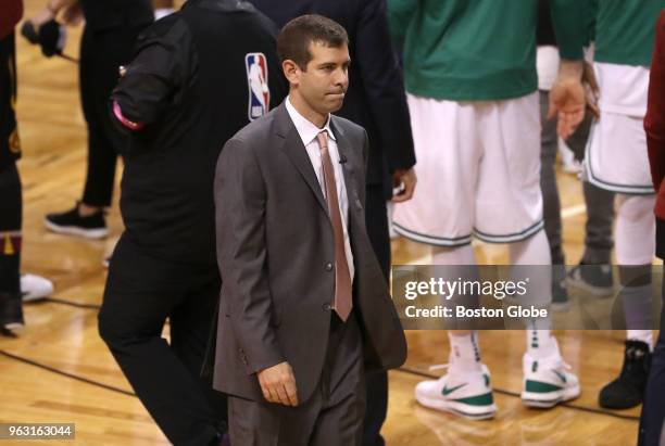 Boston Celtics head coach Brad Stevens walks off the court after their defeat to the Cleveland Cavaliers 87-79. The Boston Celtics hosted the...