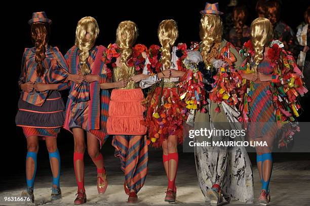 Models present creations by designer Ronaldo Fraga as part of the 2010-2011 Fall-Winter collections of the Sao Paulo Fashion Week, in Sao Paulo,...