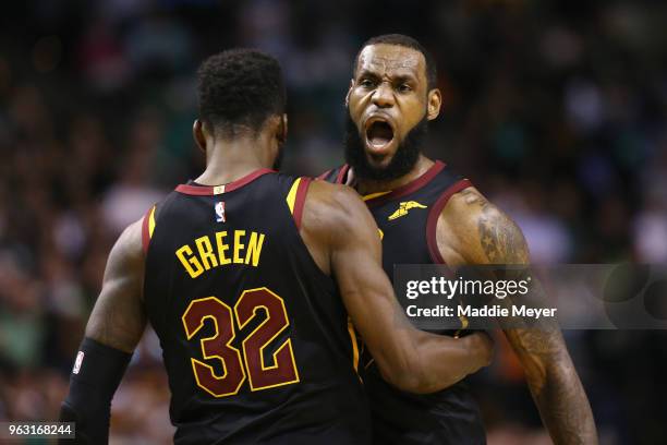 LeBron James of the Cleveland Cavaliers celebrates with Jeff Green in the second half against the Boston Celtics during Game Seven of the 2018 NBA...