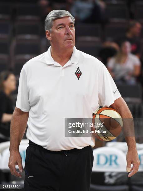 Head coach Bill Laimbeer of the Las Vegas Aces watches his team warm up before the Aces' inaugural regular-season home opener against the Seattle...