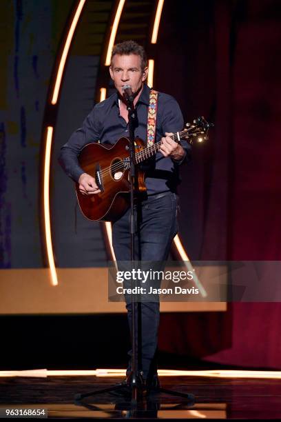 Actor Dennis Quaid performs onstage during the 6th Annual KLOVE Fan Awards at The Grand Ole Opry on May 27, 2018 in Nashville, Tennessee.