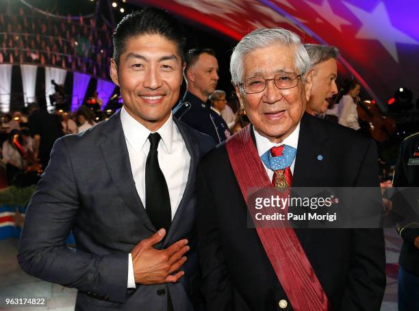 Star of Chicago Med Brian Tee and Korean War veteran Hiroshi "Hershey" Miyamura pose for a photo during the finale of the 2018 National Memorial Day...