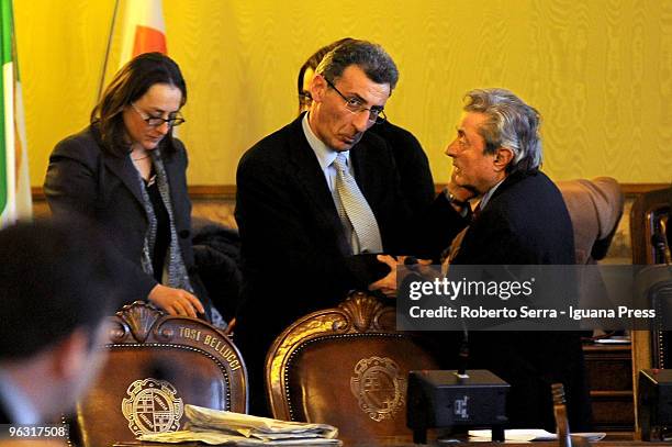 Major of Bologna Flavio Delbono with councillors Milena Naldi and Luciano Sita leave the city hall after reading his official resigns on January 28,...