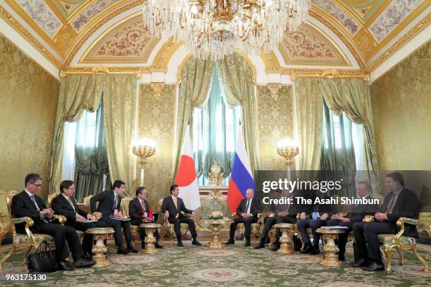 Japanese Prime Minister Shinzo Abe and Russian President Vladimir Putin talk during their meeting at Kremlin on May 26, 2018 in Moscow, Russia. Abe...