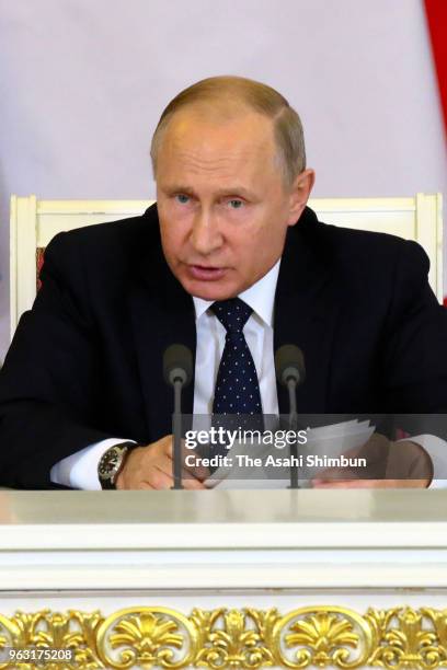 Russian President Vladimir Putin speaks during a joint press conference with Japanese Prime Minister Shinzo Abe following their meeting at Kremlin on...